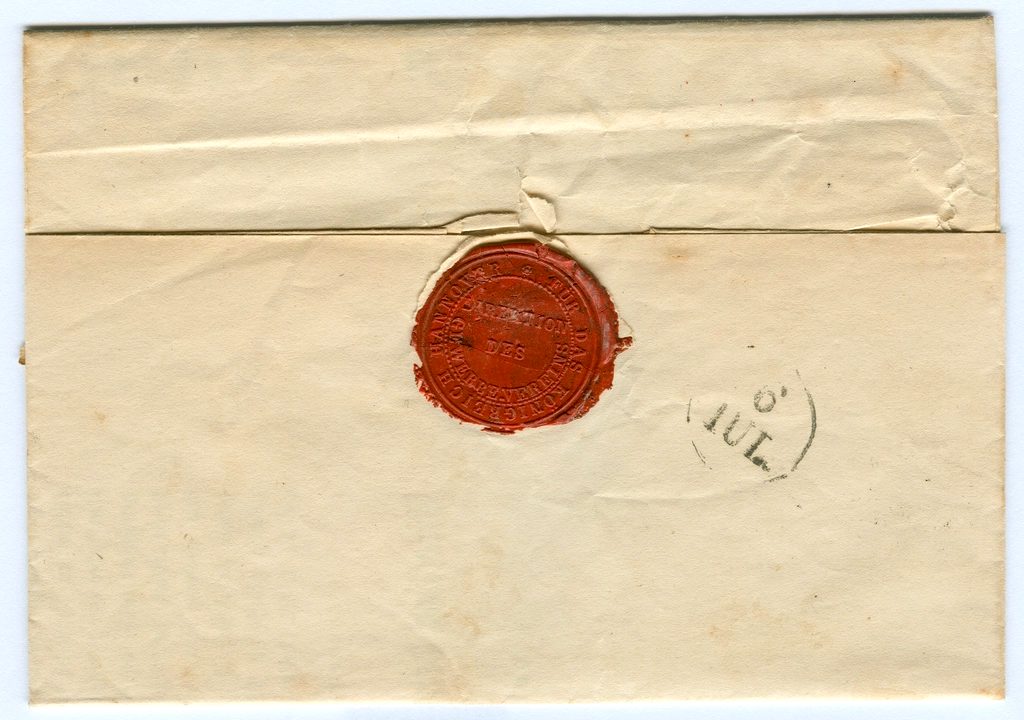 A folded letter closed with an intact wax seal.